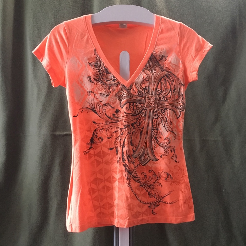 Bright orange tshirt with cross. Size Small